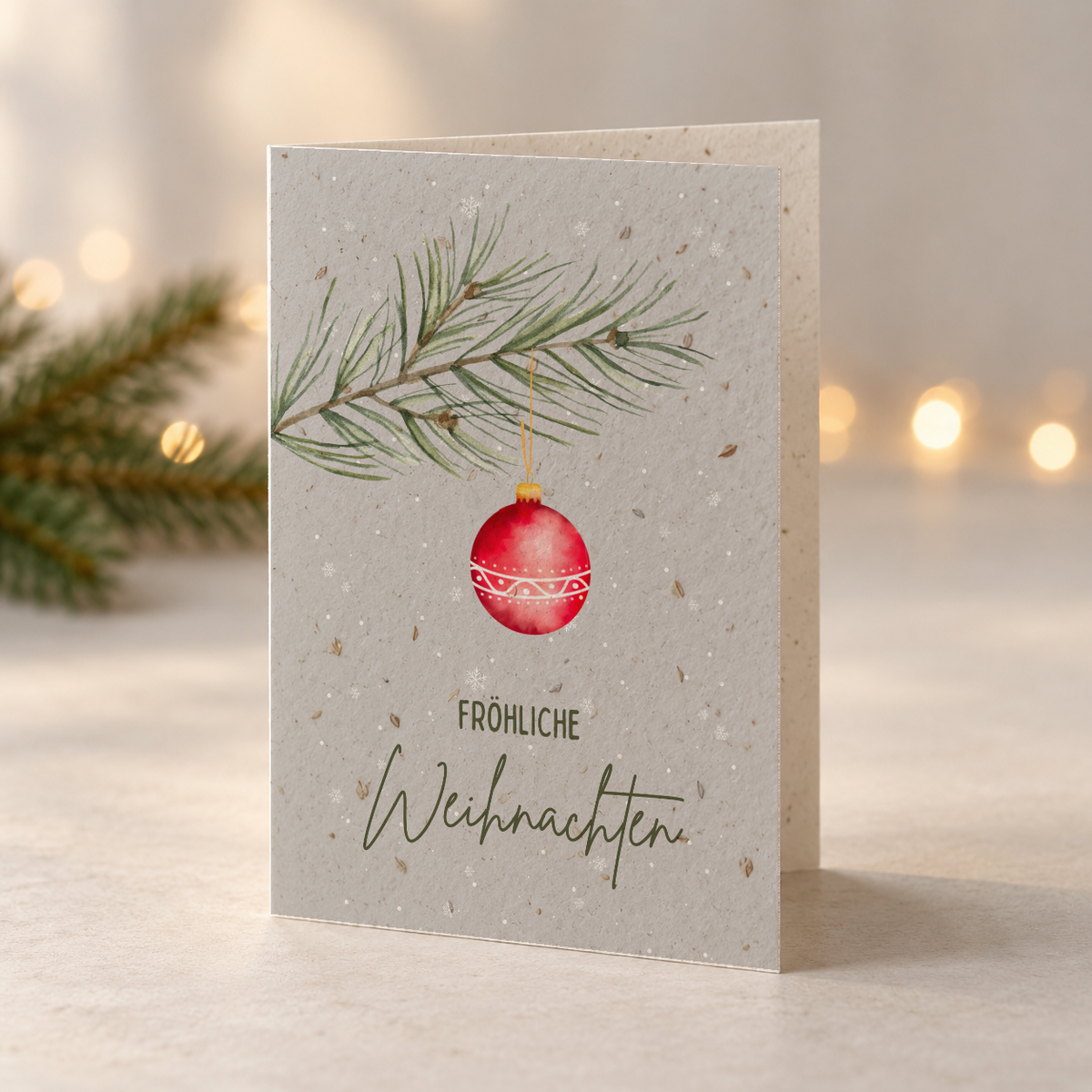 Weihnachtskarte aus Saatpapier – Rote Winterkugel