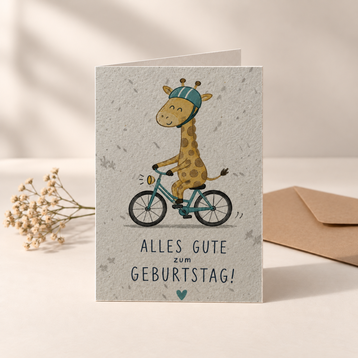 Geburtstagskarte aus Saatpapier – Giraffe auf dem Fahrrad
